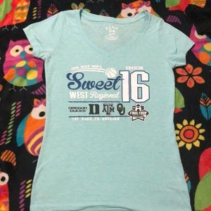 a turquoise tee